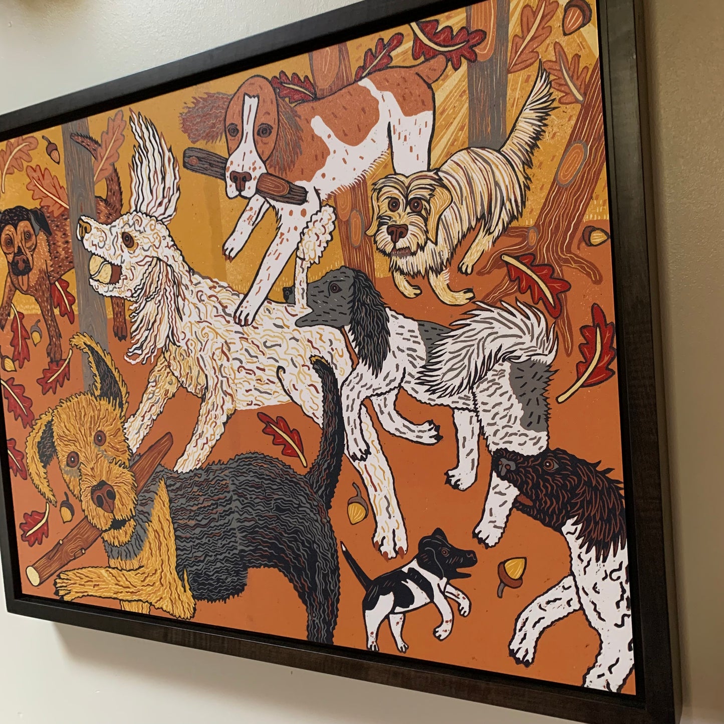 Big dog woodcut with poodles and friends framed in black