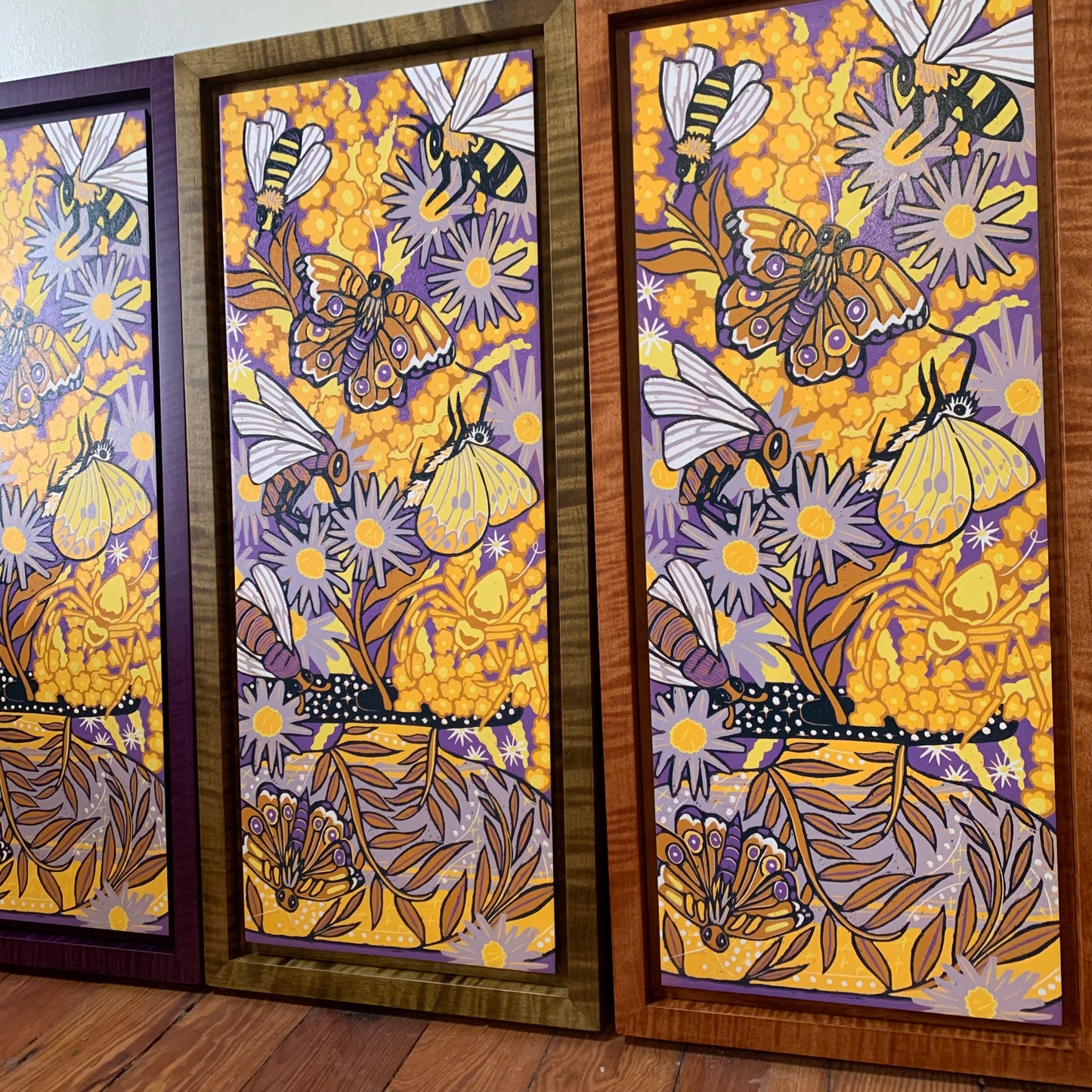 Aster and goldenrod woodcut framed in nutmeg natural curly maple