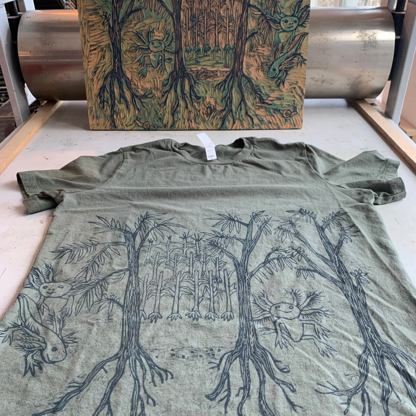 Olive color handprinted axolotl shirt pre-order will ship around April 20