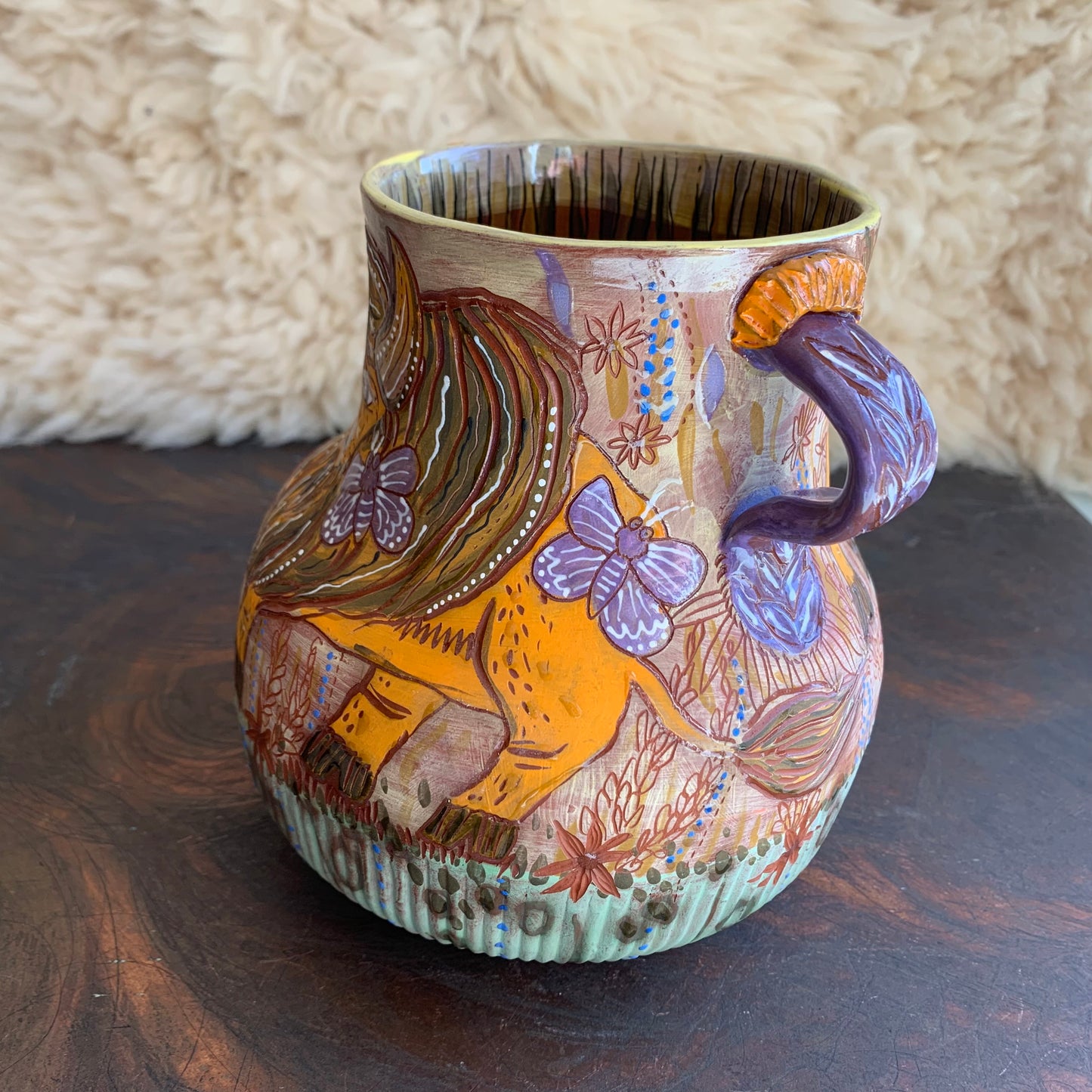Bison and blue butterfly vase