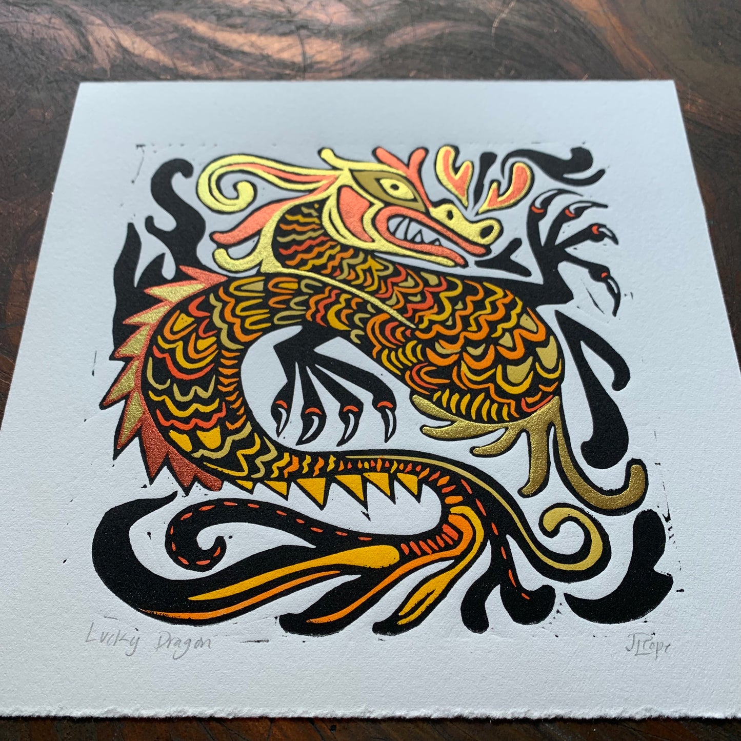 Orange Dragon Linocut