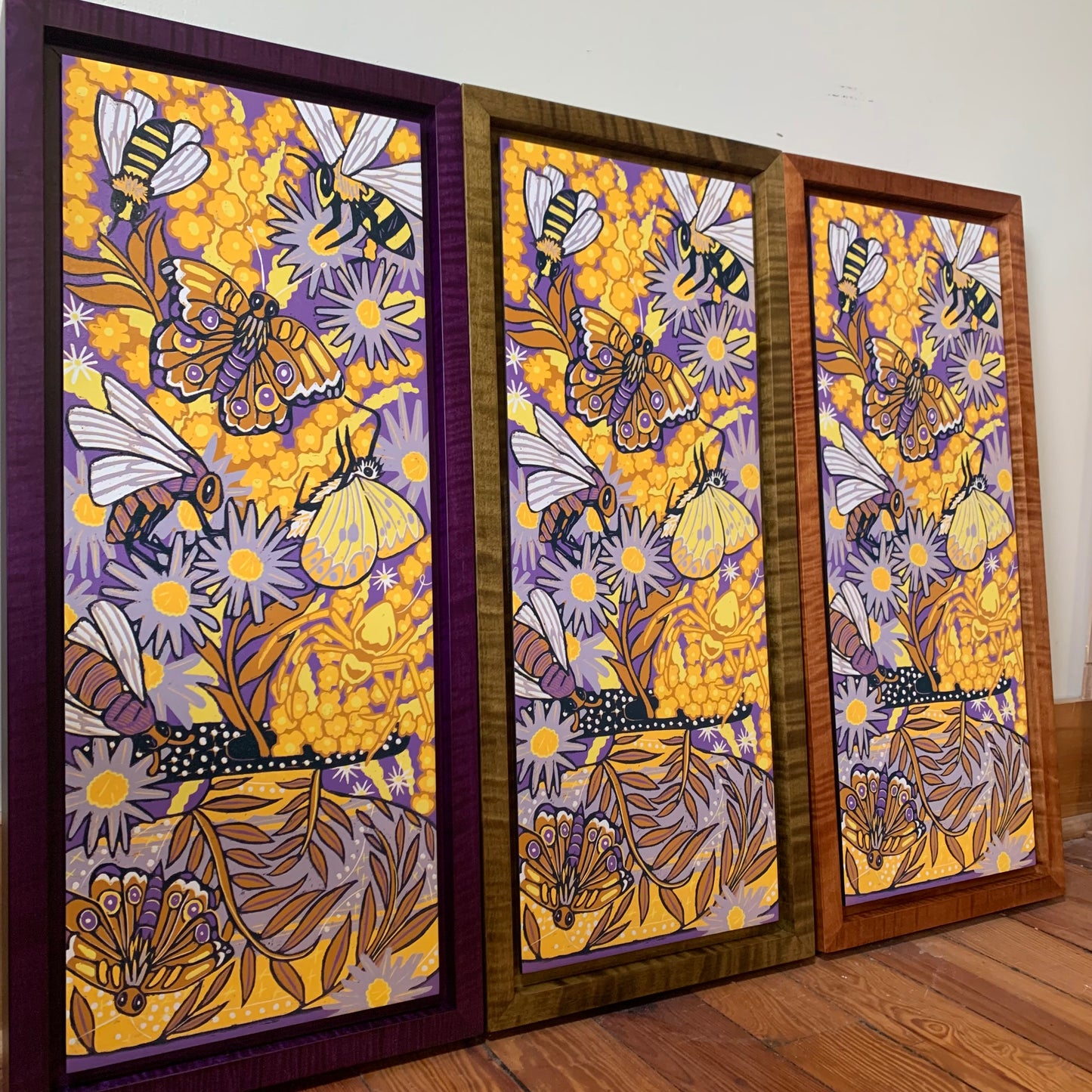 Aster and goldenrod woodcut framed in nutmeg natural curly maple