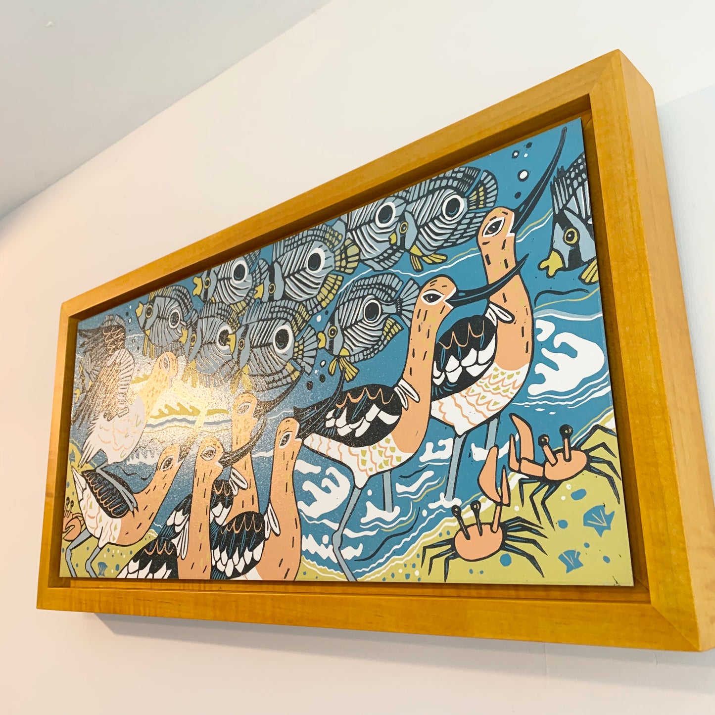 Avocet woodcut framed in yellow