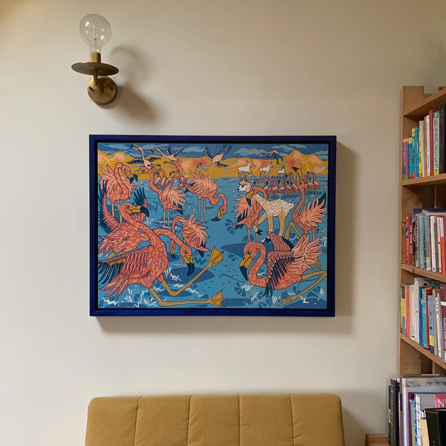 Flamingo and llama woodcut framed in blue