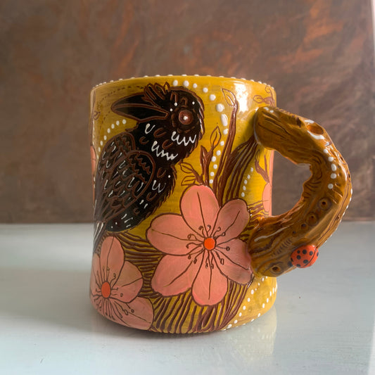 Raven cherry blossom mug